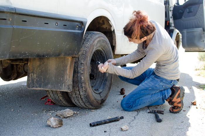 Marti changing the vans wheel in Greece