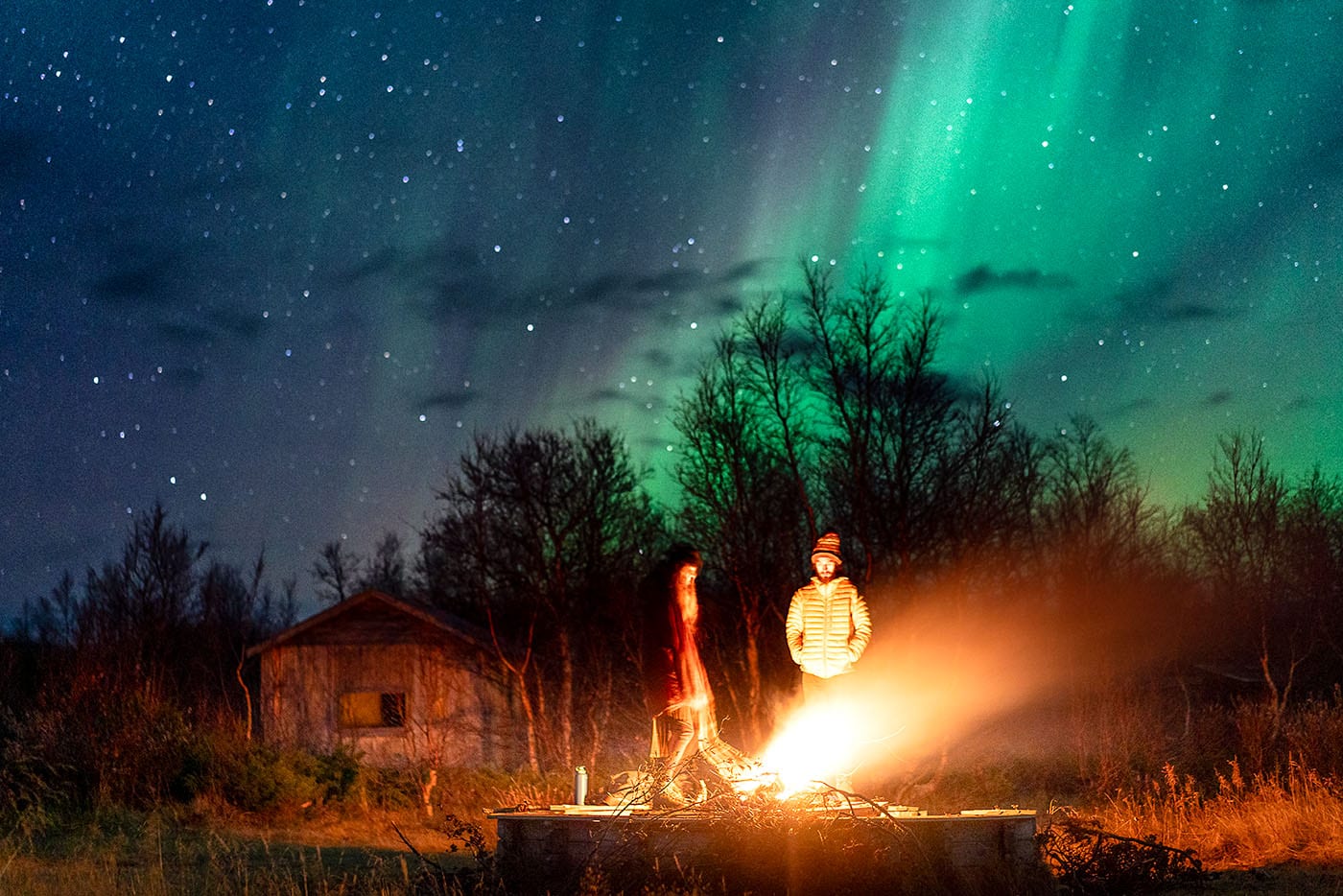aurora over campfire