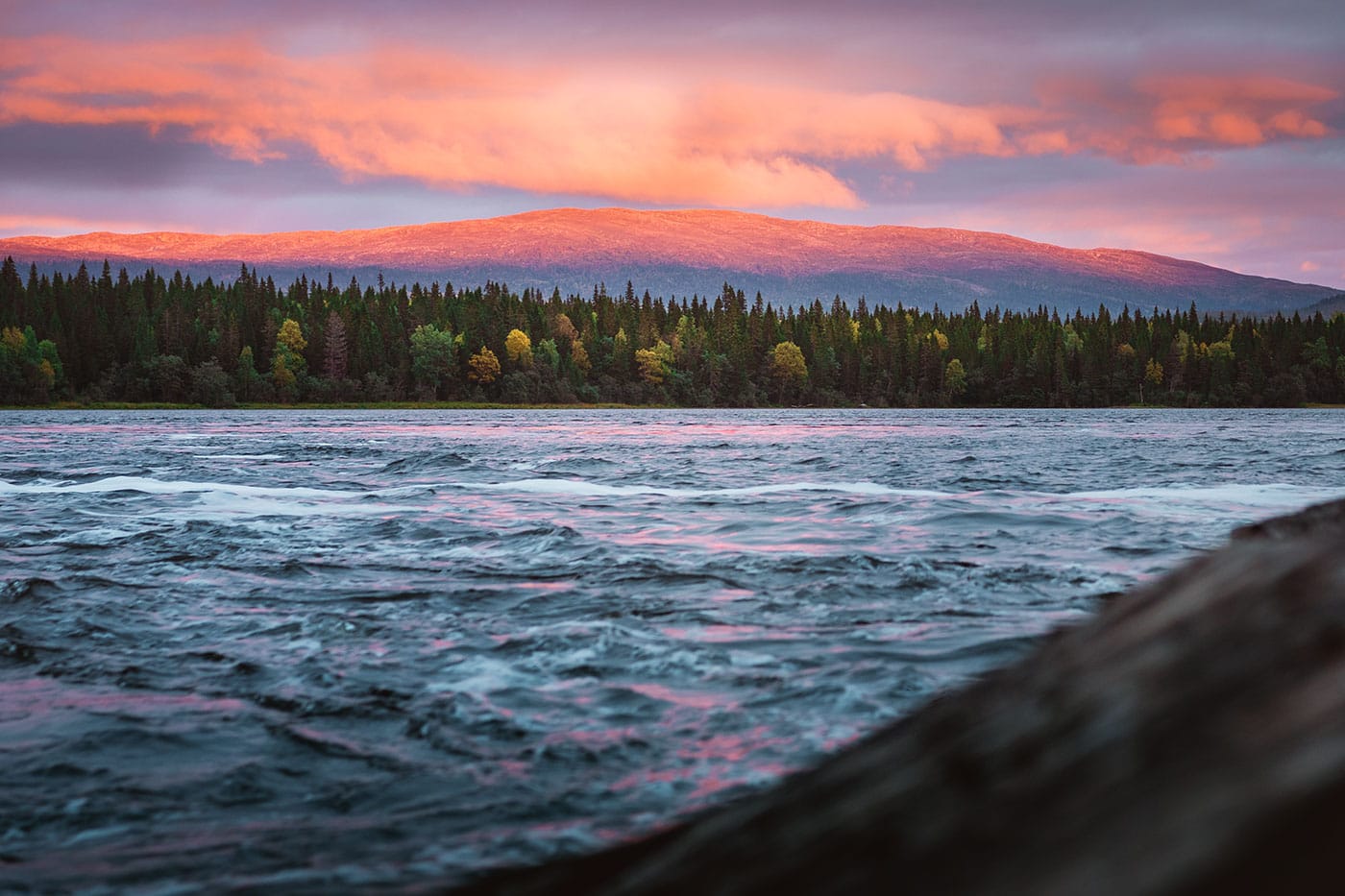 Photographing sunset at Tännforsen waterfall