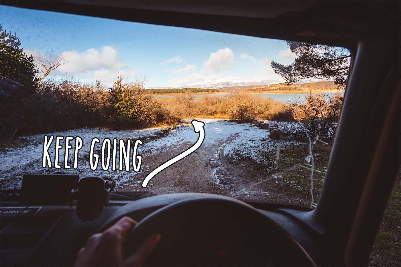 driving campervan POV on sand roads to find a camping spot